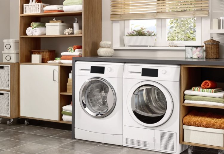 Domestic laundry room with washing machine and dryer Domestic laundry room with washing machine and dryer