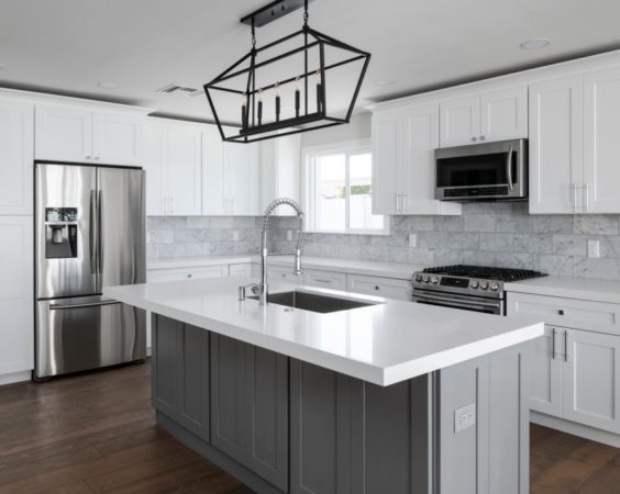 Color photo of a beautiful modern kitchen. Color photo of a beautiful modern kitchen.