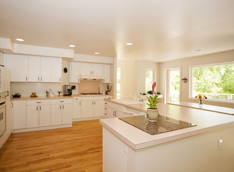 Photo of a spacious modern kitchen with lots of natural light.